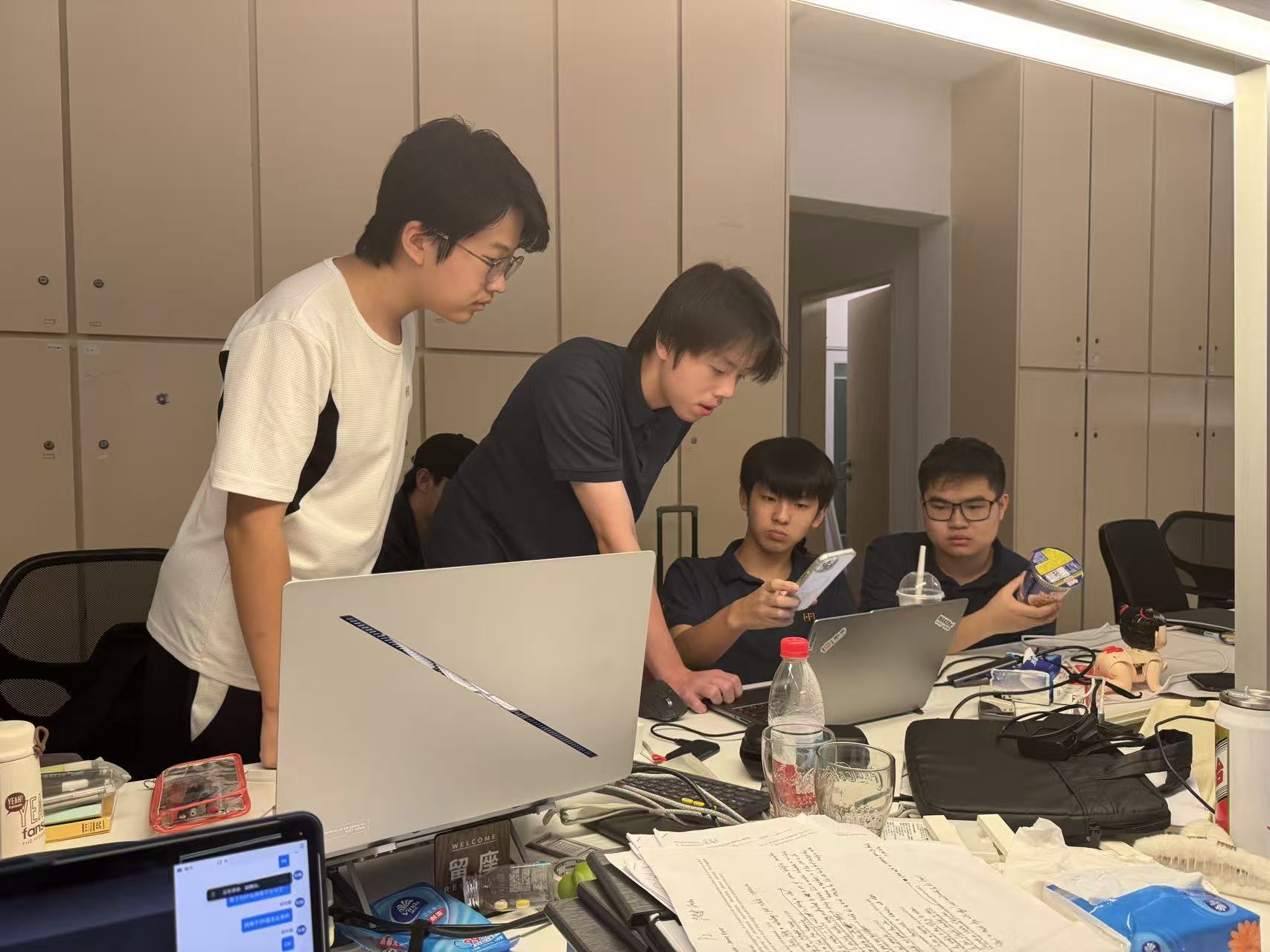 Jeffery working with classmates during a MAKERs' Club activity.